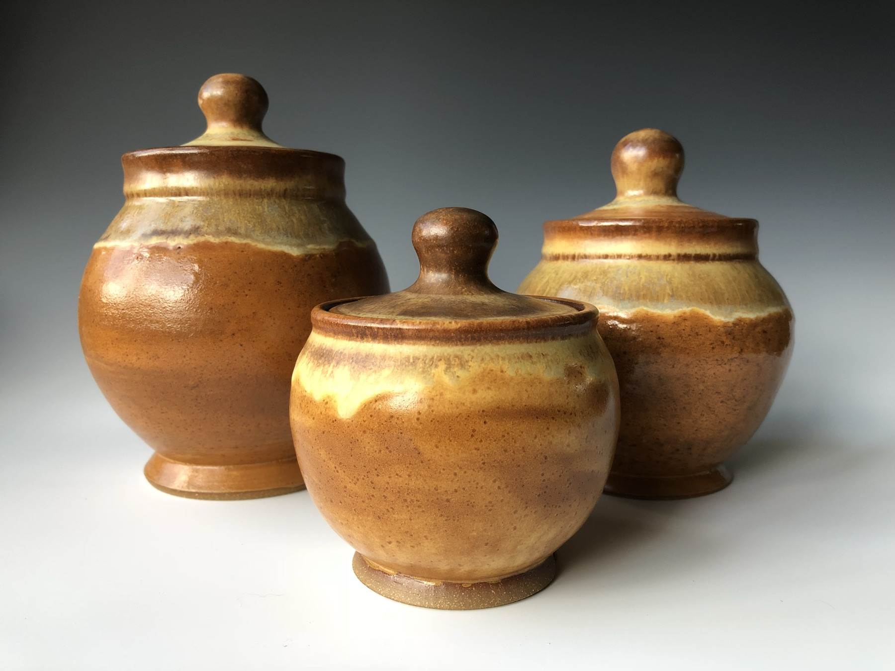 Amber lidded jars (photo 1 of 2)